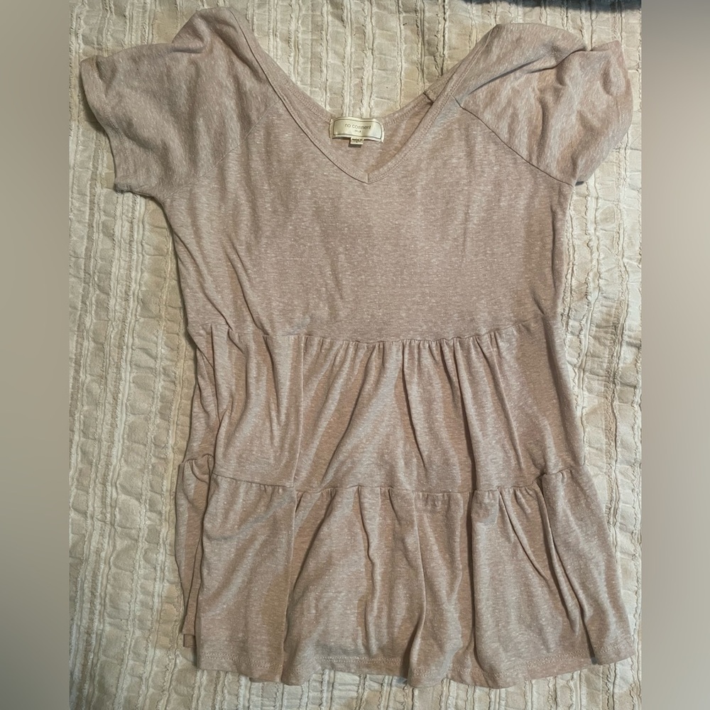Cream colored shirt. Never worn. Size L